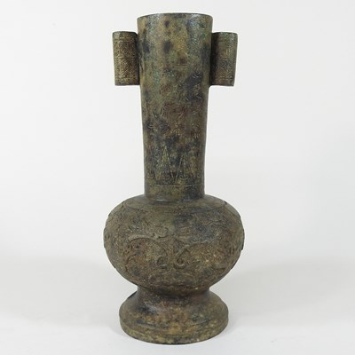 Lot 660 - A bronze vase