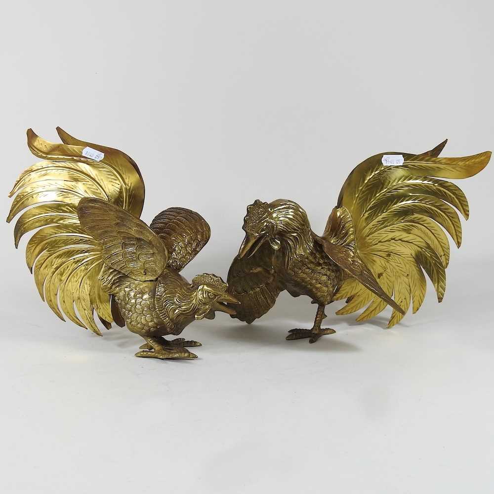 Lot 633 - A pair of brass cockerels