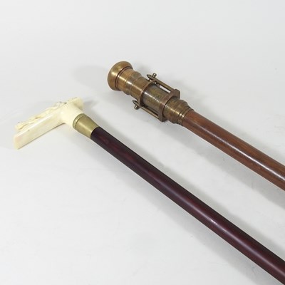 Lot 212 - A compass/telescope walking stick