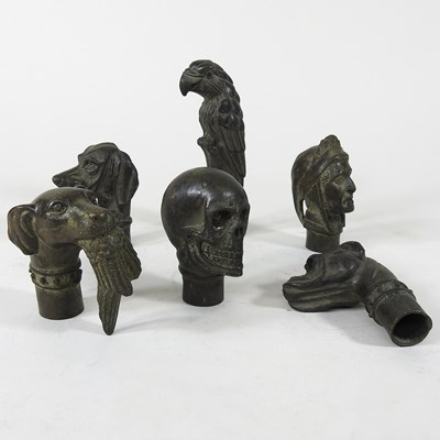 Lot 489 - Six bronze walking stick handles