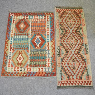 Lot 227 - A kelim runner