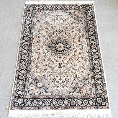 Lot 382 - A keshan style rug