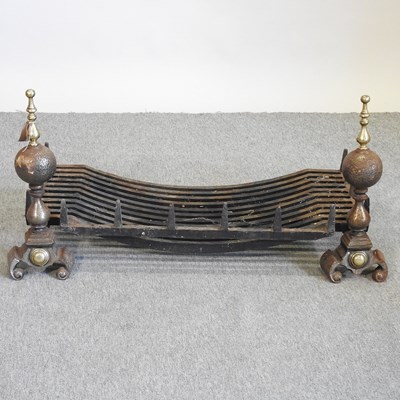 Lot 663 - A cast iron fire grate