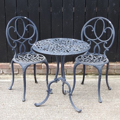 Lot 312 - A garden table and chairs