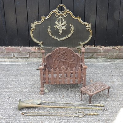 Lot 367 - A fire grate and tools