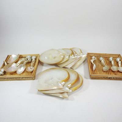 Lot 128 - A set of natural shell plates and spoons