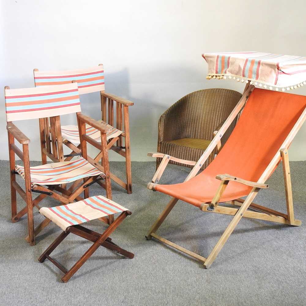 Lot 359 A folding deck chair with a canopy