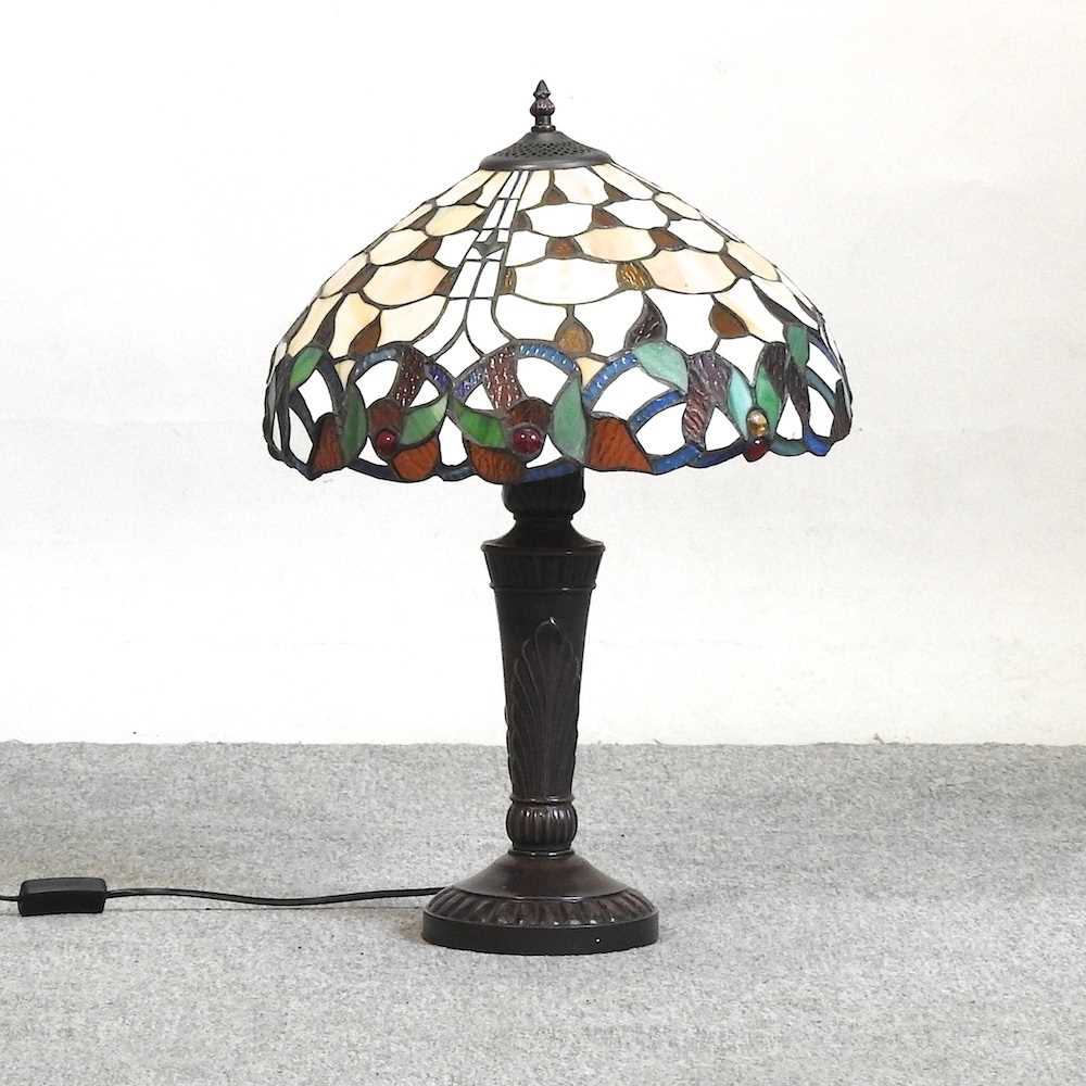 Lot 551 - A Tiffany style table lamp