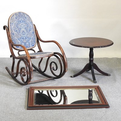 Lot 530 - A Thonet style bentwood rocking chair