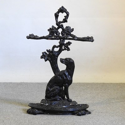 Lot 94 - A black painted cast iron stick stand
