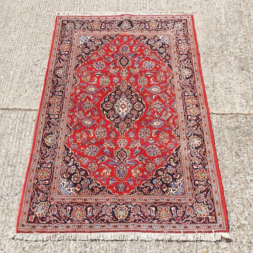 Lot 521 - A Kashan rug