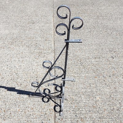 Lot 319 - A painted iron wall bracket