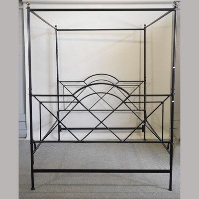 Lot 377 - A black painted metal four poster bedstead