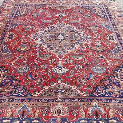 Lot 385 - A large carpet