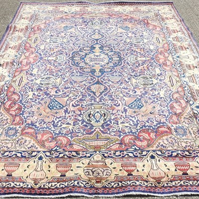 Lot 388 - An Iranian woollen carpet