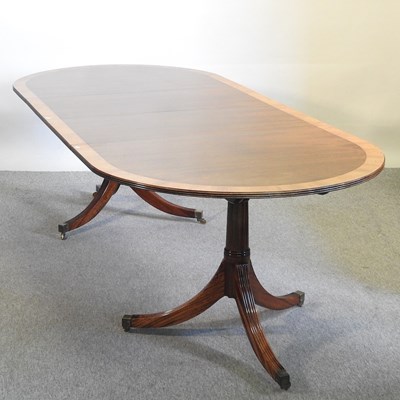 Lot 535 - A dining table