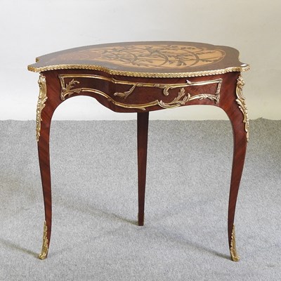 Lot 517 - A marquetry occasional table