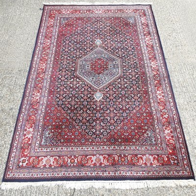 Lot 569 - A Persian carpet