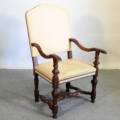 Lot 424 - A cream upholstered open armchair