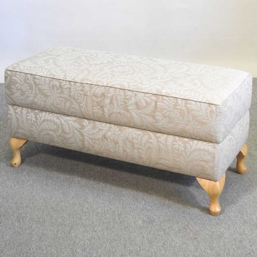 Lot 503 - A cream upholstered ottoman