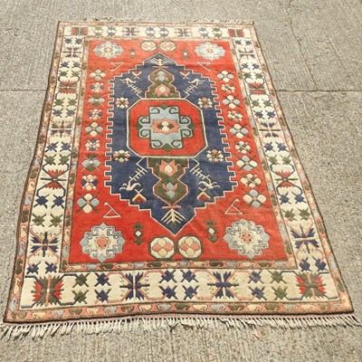 Lot 634 - A Turkish carpet