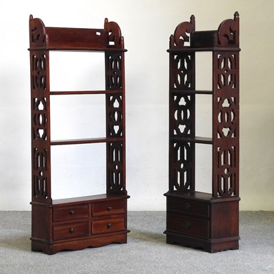 Lot 632 - A matched pair of mahogany bookshelves