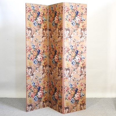 Lot 431 - A three fold floral fabric screen