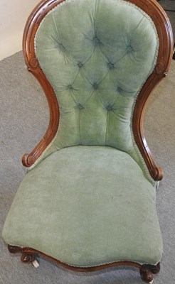 Lot 603 - A Victorian button back chair