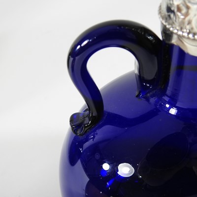 Lot 17 - A 19th century coloured glass claret jug