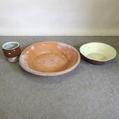 Lot 154 - A terracotta dairy bowl