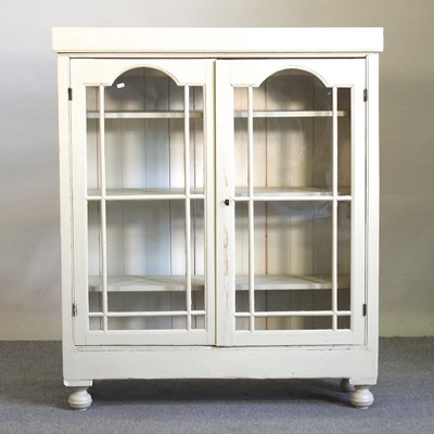 Lot 384 - A white painted glazed bookcase