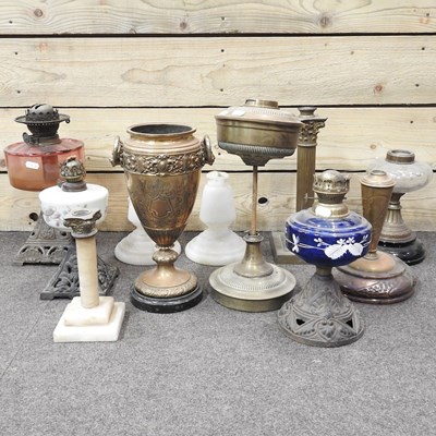 Lot 204 - A collection of oil lamp bases