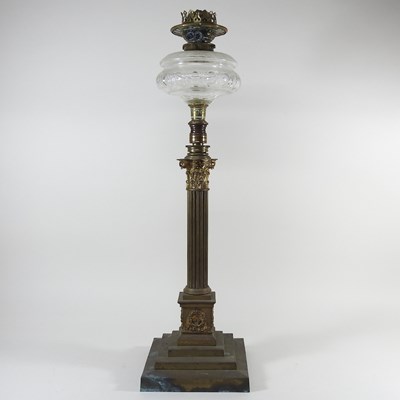 Lot 106 - A telescopic column oil lamp