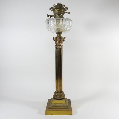 Lot 19 - A Corinthian column oil lamp