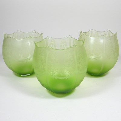 Lot 53 - Three green glass lamp shades