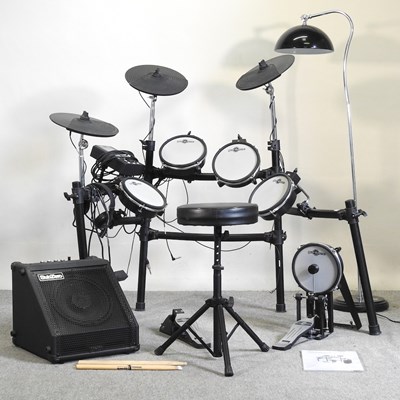 Lot 585 - An electronic drum kit