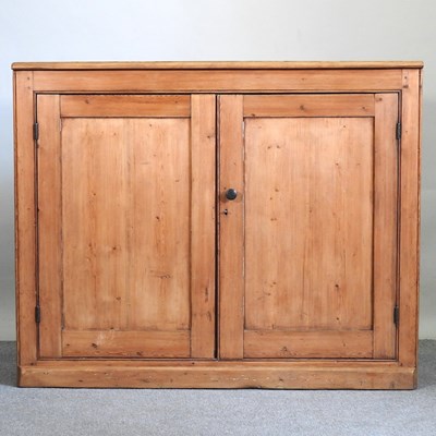 Lot 387 - An antique pine cabinet