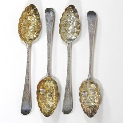 Lot 121 - A set of four silver berry spoons