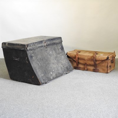 Lot 594 - A leather bound trunk