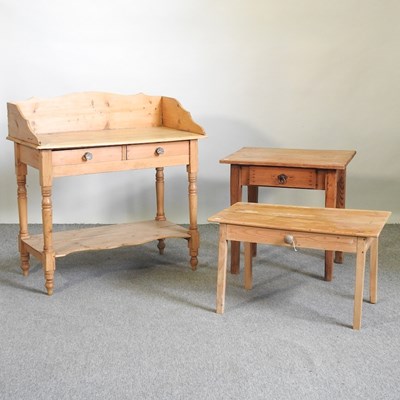 Lot 608 - A pine wash stand and two tables