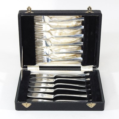 Lot 305 - A set of silver fish cutlery