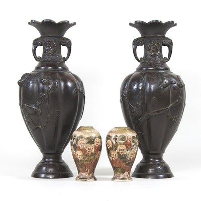 Lot 707 - A pair of Japanese bronzed vases