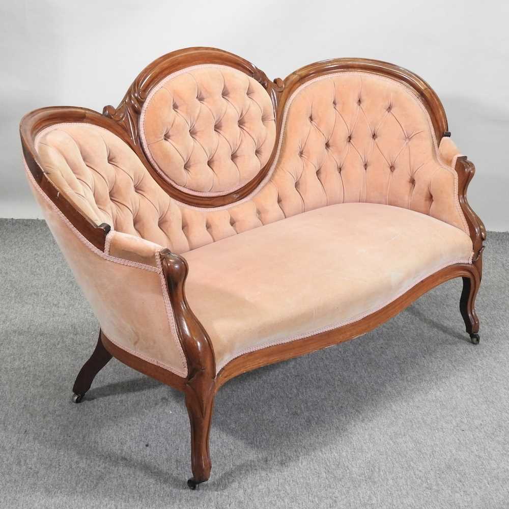 Lot 493 A Victorian style upholstered sofa,