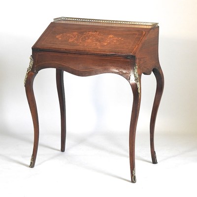 Lot 168 - An inlaid bureau