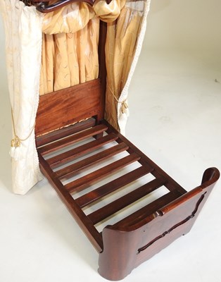 Lot 113 - A miniature bed