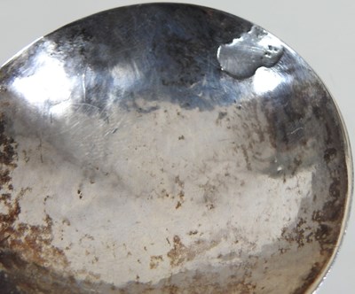 Lot 49 - A sejant silver spoon