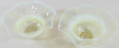 Lot 75 - A pair of vaseline glass light shades