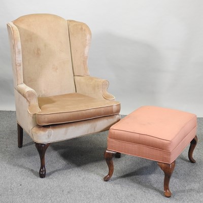 Lot 496 - A wing armchair