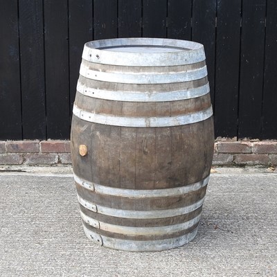 Lot 402 - A large coopered oak barrel