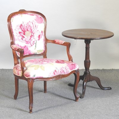 Lot 680 - An arm chair and table